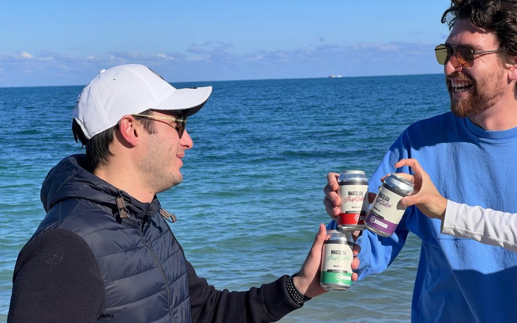 two men share cans of inmaculada snapchilled coffee