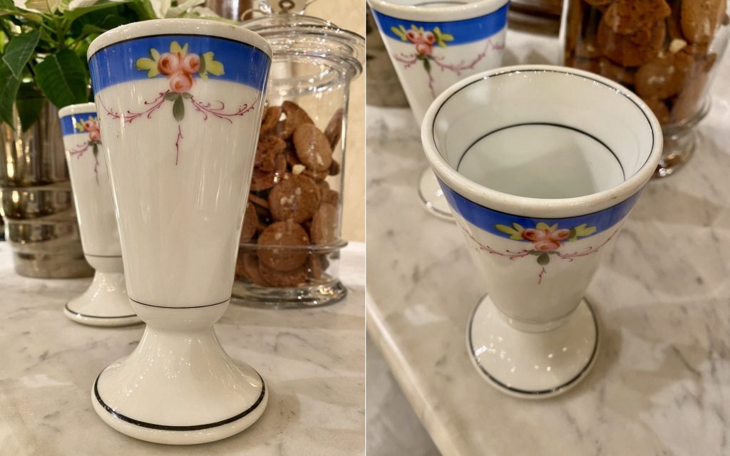 Two traditional-style porcelain mazagran cups.