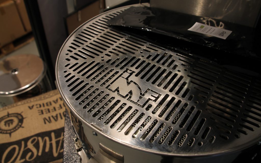 Metal cover on an IMF roaster